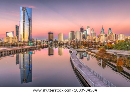 Philadelphia, Pennsylvania, USA downtown city skyline on the Schuylkill River at twilight.