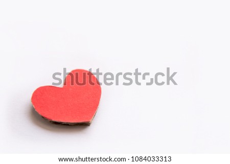 Valentines Day background with red heart shape on white background with copy space 