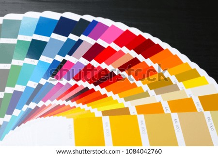 Color palette samples on black background, closeup