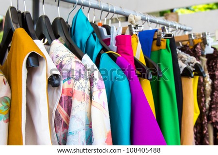 fashion clothing on hangers at the show Royalty-Free Stock Photo #108405488