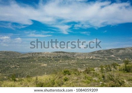 Beautiful nature and landscape photo of Dalmatia in Croatia Europe. Nice sunny spring day with blue sky and mountains at horizon. Calm, peaceful, joyful and happy outdoors image.