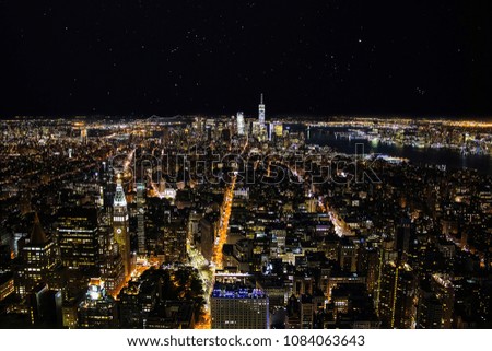 Aerial panoramic view of Manhattan at night with starry sky,