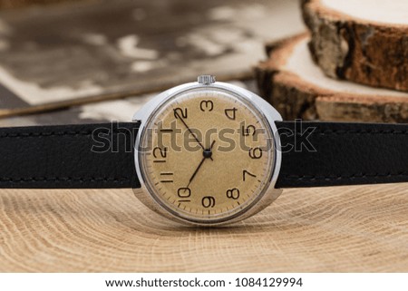 Wristwatch in wooden decorations