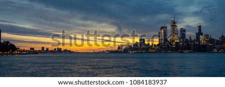 Midtown Manhattan New York City Cityscape Skyline at Sunrise from Hoboken New Jersey, across the Hudson River.
