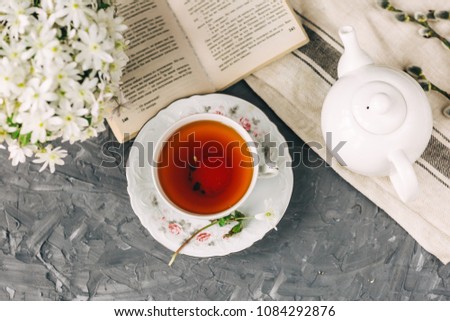 tea, white flowers at the window, still life