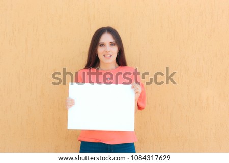 Cheerful Woman Holding White Blank Advertising Sign. Promoter girl showcasing commercial signboard

