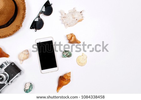 Traveler accessories on white background with copy space. Top view travel or vacation concept. Summer background.