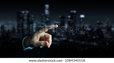 Businessman pointing finger on blurred background 