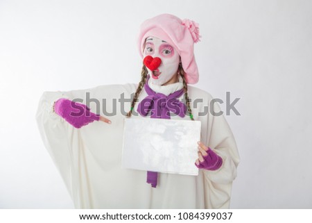 mime girl holding a sign for inscriptions. Human emotions
