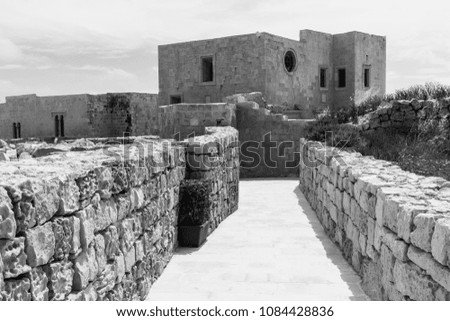 Victoria also known among the native Maltese as Rabat on maltese island Gozo. Labyrinth of narrow streets in the citadel. Black and white picture 