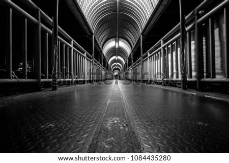Black & White Picture Concept Directions floor pedestrian bridge at night