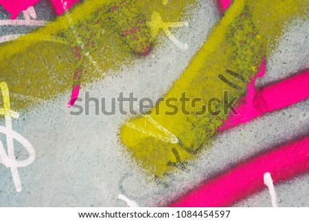 Dirty wall, soiled in yellow and pink paint.  Unusual background