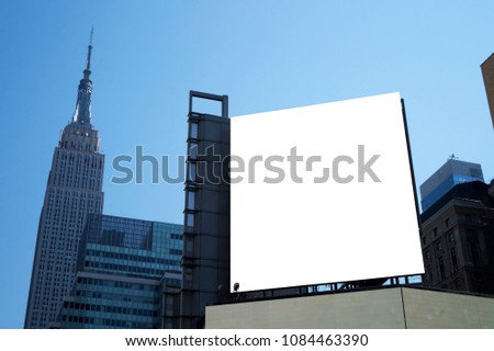 Isolated white billboard in new york city with iconic background and copy space