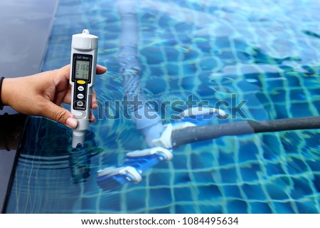 Resort Private pool has weekly check maintenance test, Salt Meter Level, to make sure water is clean and can swim Royalty-Free Stock Photo #1084495634