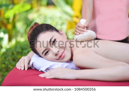 Beautiful Asian girl doing spa massage