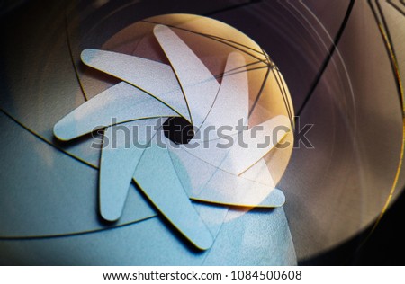 Closed aperture blades in a glass digital DSLR photography lens
