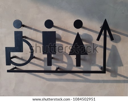Abstract shadow of toliet sign