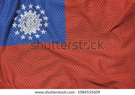Myanmar flag printed on a polyester nylon sportswear mesh fabric with some folds
