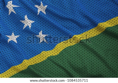 Solomon Islands flag printed on a polyester nylon sportswear mesh fabric with some folds