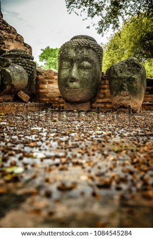 Broken Buddha in Wat Ratchaburana Historical Site, Ayutthaya Province, Thailand.
