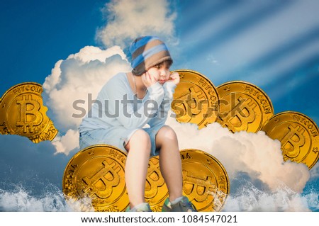 Cute boy sat looking at the gold  Bitcoin  On the clouds, there is light shining through, with the sky in background, Concept Value abstract of  currency, digital world.