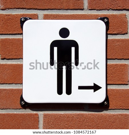 Toilet or WC direction sign for man and boys.