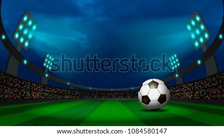 Night view at the football stadium with the ball