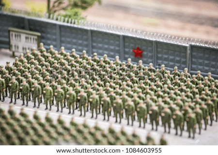 The miniature people in scale. A formation of soldiers. Build military units on the parade ground. The border troops.