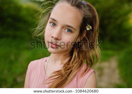 Portrait of a pretty teen girl  outdoor.