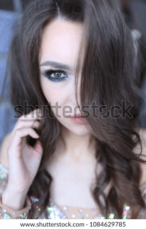 brown-haired woman in a beautiful dress