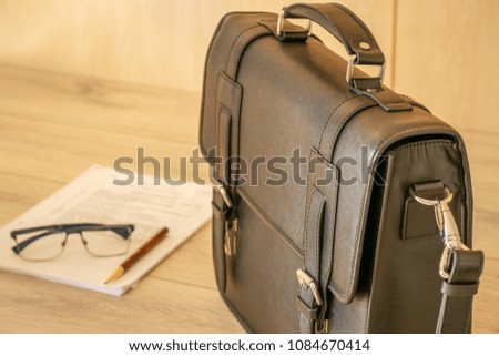Close up of briefcase  and study summaries