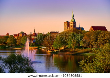 evening scene with skyline of historic Stralsund Royalty-Free Stock Photo #1084806581