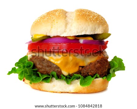 Traditional hamburger with cheese, lettuce, onion, tomato and pickle isolated on a white background Royalty-Free Stock Photo #1084842818
