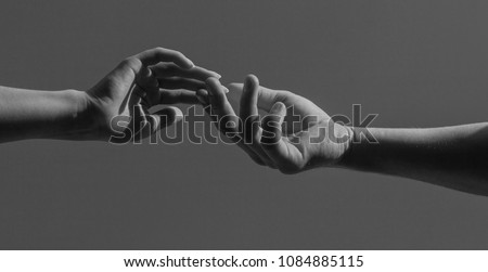 Image of two hands of man and woman on white background