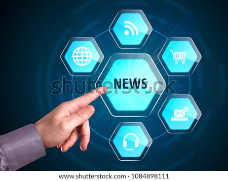 Business, Technology, Internet and network concept. Young businessman shows the word: News