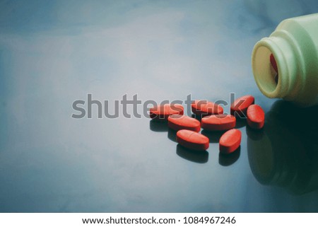 close up medicine tablet and bottle on table with copy space background for text, world health day, healthcare technology concept