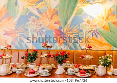 Tea party and cake with roses