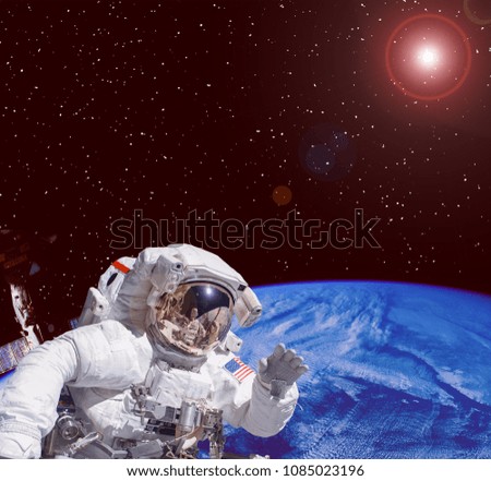 Closeup of astronaut in space. The elements of this image furnished by NASA.