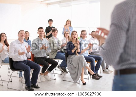 Young people having business training in office Royalty-Free Stock Photo #1085027900