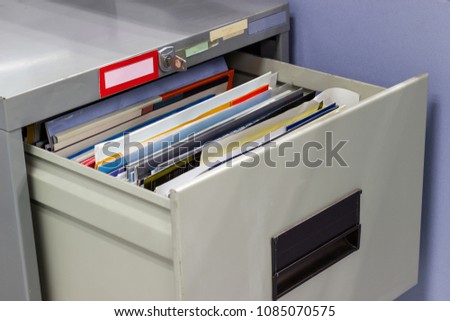 file folder documents In a file cabinet retention concept business office equipment