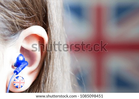 Girl is learning english with british flag abstract background concept