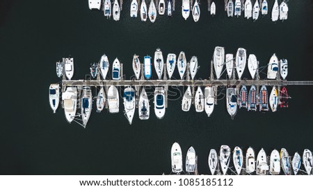 Top view of boats at marina dock.