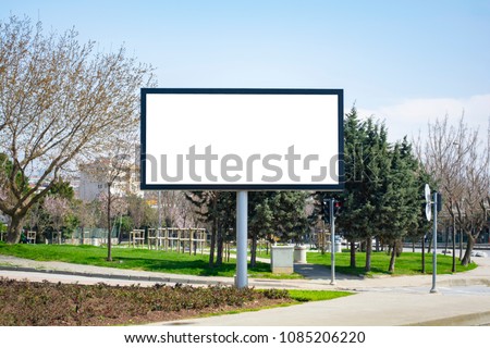 Large blank billboard located on the side of the road.