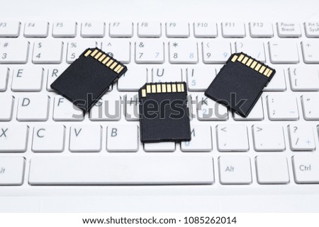 black memory sd cards on the laptop keyboard