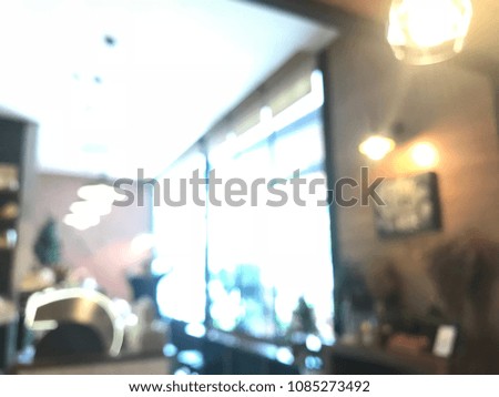 Blurred background of cafe shop, decoration with light and flags
