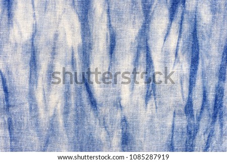 natural indigo blue tie dye on linen fabric texture  