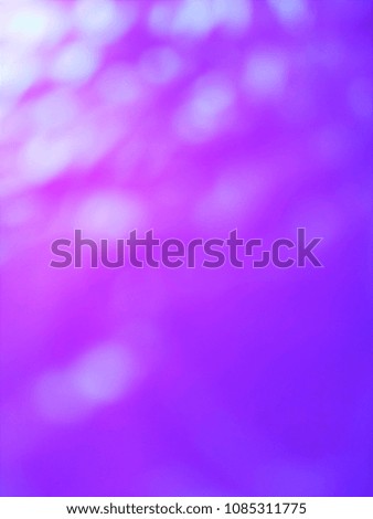 Abstract background of Blue, Purple and White color with bokeh defocused lights. Image is good to use as an Light Overlay. 