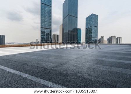 Empty Road with modern business office building 
