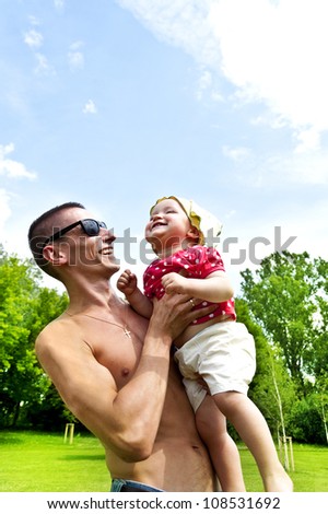 Father play's with his baby girl