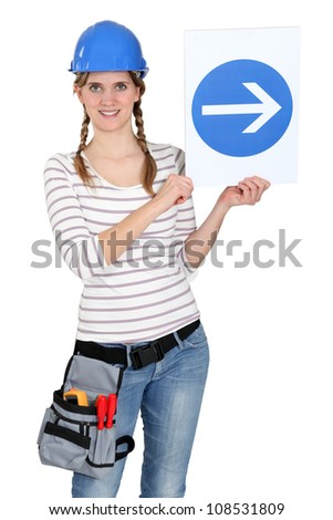 Woman with a one way sign